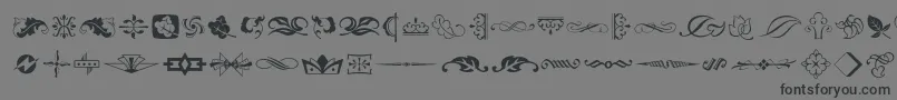 Artornament-Schriftart – Schwarze Schriften auf grauem Hintergrund