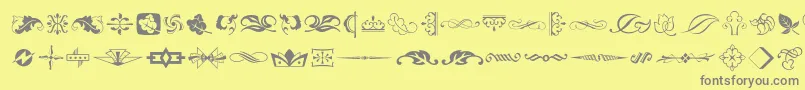 Artornament Font – Gray Fonts on Yellow Background