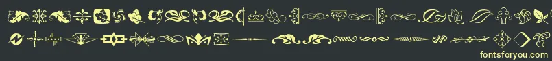 Artornament Font – Yellow Fonts on Black Background