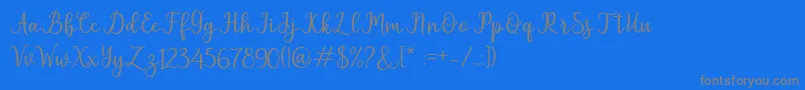 フォントpruistin – 青い背景に灰色の文字