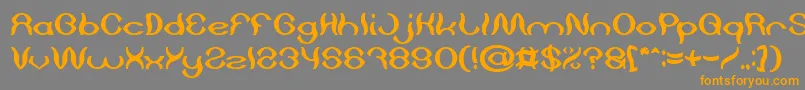 フォントPsychedelic Bold – オレンジの文字は灰色の背景にあります。