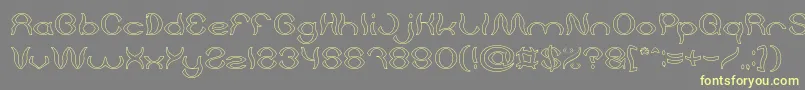 Psychedelic Hollow Font – Yellow Fonts on Gray Background