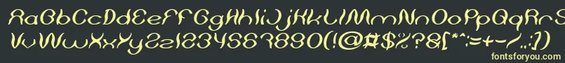 Czcionka Psychedelic Italic – żółte czcionki na czarnym tle