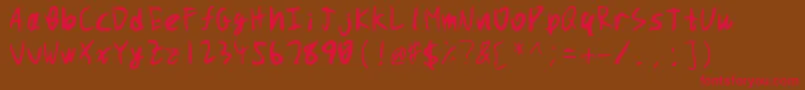 フォントpuchimono2   5 25 svg – 赤い文字が茶色の背景にあります。