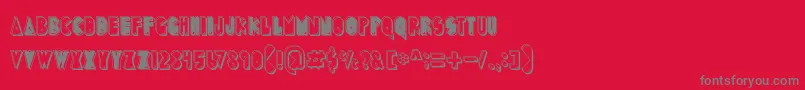 PuckMan-Schriftart – Graue Schriften auf rotem Hintergrund