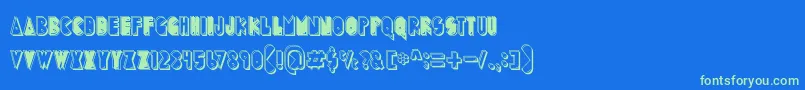 PuckMan Font – Green Fonts on Blue Background