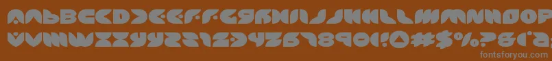 puffangelexpand-Schriftart – Graue Schriften auf braunem Hintergrund