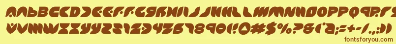 フォントpuffangelsemital – 茶色の文字が黄色の背景にあります。