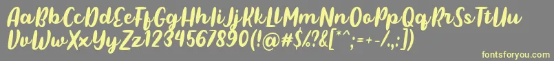 Шрифт Pulen Font by Rifki 7NTypes – жёлтые шрифты на сером фоне