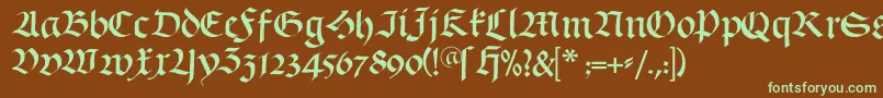 フォントSchwabach – 緑色の文字が茶色の背景にあります。