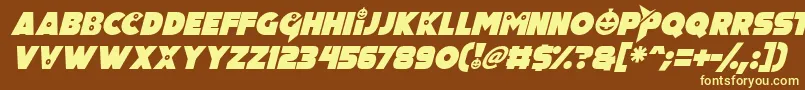 Pumpkin King Italic-fontti – keltaiset fontit ruskealla taustalla