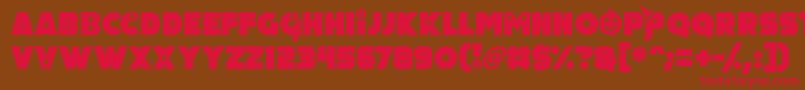 フォントPumpkin King – 赤い文字が茶色の背景にあります。