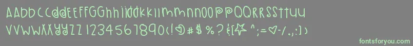 PumpkinSeeds-Schriftart – Grüne Schriften auf grauem Hintergrund