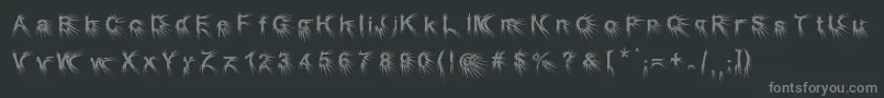 Puncher-fontti – harmaat kirjasimet mustalla taustalla