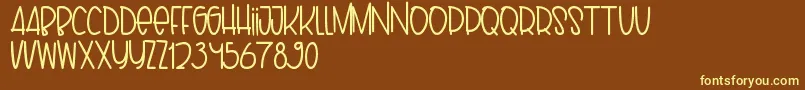 Puppy Font – Yellow Fonts on Brown Background