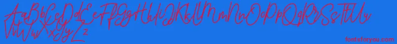 Pure Tintri FREE Font – Red Fonts on Blue Background