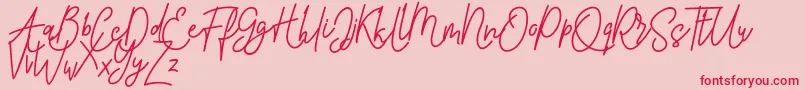 Pure Tintri FREE-Schriftart – Rote Schriften auf rosa Hintergrund