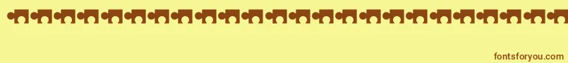 フォントPuzzle – 茶色の文字が黄色の背景にあります。