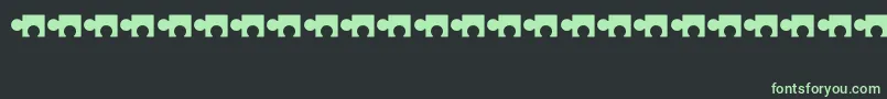 フォントPuzzle – 黒い背景に緑の文字