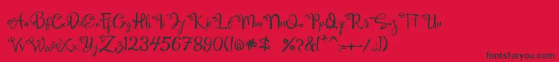 フォントQamari Script – 赤い背景に黒い文字