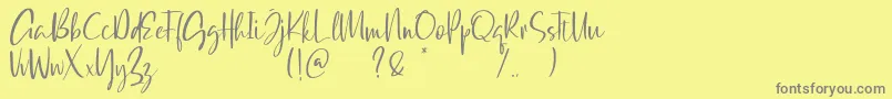 Qatar Capital Demo Font – Gray Fonts on Yellow Background