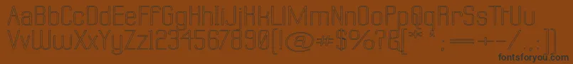 LabtopSuperwideOutline Font – Black Fonts on Brown Background