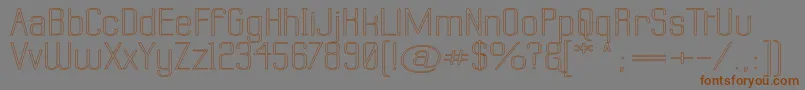 LabtopSuperwideOutline-fontti – ruskeat fontit harmaalla taustalla