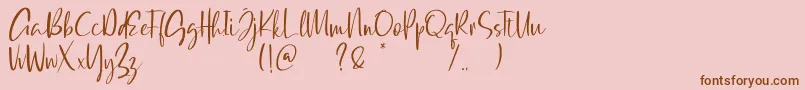Qatar Capital Demo Font – Brown Fonts on Pink Background