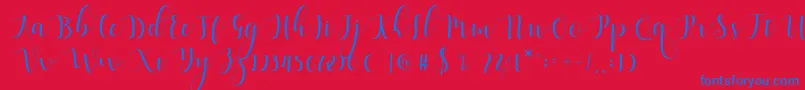 Qatielia Script Font – Blue Fonts on Red Background