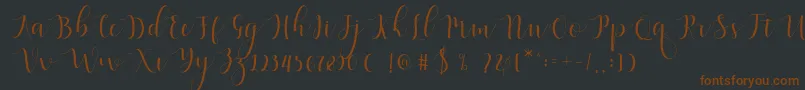 Qatielia Script-fontti – ruskeat fontit mustalla taustalla