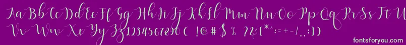 Fonte Qatielia Script – fontes verdes em um fundo violeta