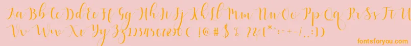 Fonte Qatielia Script – fontes laranjas em um fundo rosa