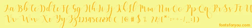 Qatielia Script-Schriftart – Orangefarbene Schriften auf gelbem Hintergrund