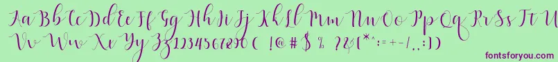 Fonte Qatielia Script – fontes roxas em um fundo verde