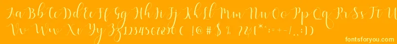 Qatielia Script-Schriftart – Gelbe Schriften auf orangefarbenem Hintergrund