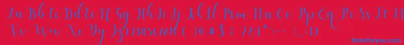 Fonte Qatielia Script – fontes azuis em um fundo vermelho