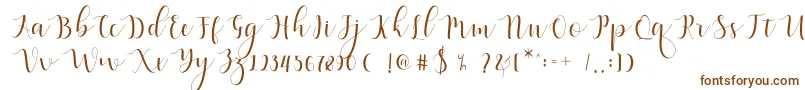 Qatielia Script-fontti – ruskeat fontit valkoisella taustalla