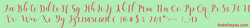 Qatielia Script-Schriftart – Rote Schriften auf grünem Hintergrund