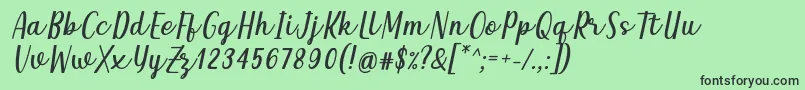 フォントQeiza Italic Font by Rifky 7NTypes – 緑の背景に黒い文字