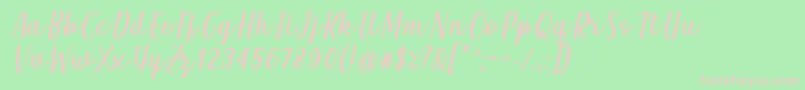 Qeiza Italic Font by Rifky 7NTypes-fontti – vaaleanpunaiset fontit vihreällä taustalla