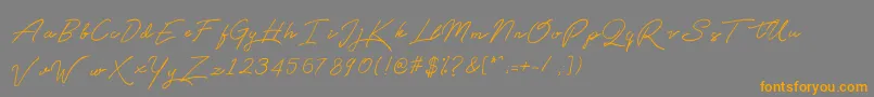 Qetey Font – Orange Fonts on Gray Background