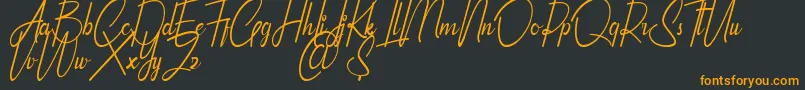 Qhinanttika Personal Use Only Font – Orange Fonts on Black Background