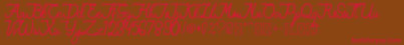 QiaraTosfa Font – Red Fonts on Brown Background