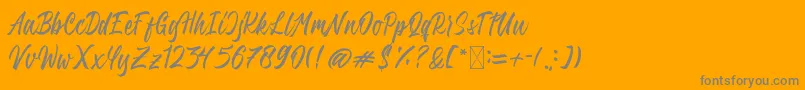 QimailaScript-Schriftart – Graue Schriften auf orangefarbenem Hintergrund