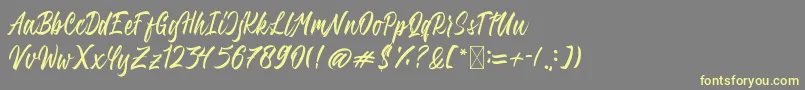 QimailaScript Font – Yellow Fonts on Gray Background