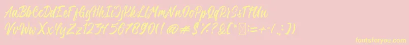QimailaScript Font – Yellow Fonts on Pink Background