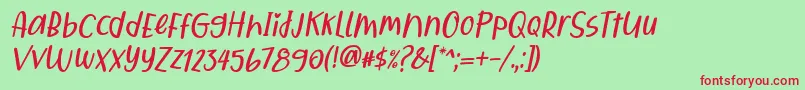 フォントQiyoshi Italic – 赤い文字の緑の背景
