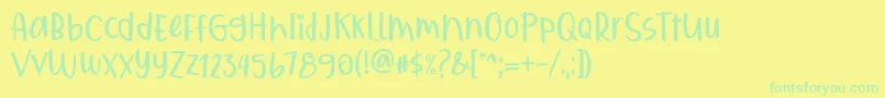 Qiyoshi Regular-Schriftart – Grüne Schriften auf gelbem Hintergrund