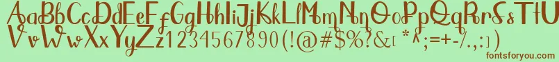 Qlinsey Font – Brown Fonts on Green Background