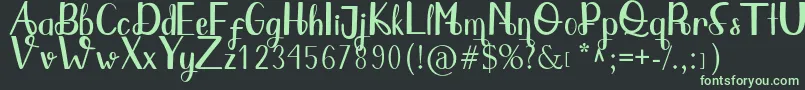 フォントQlinsey – 黒い背景に緑の文字
